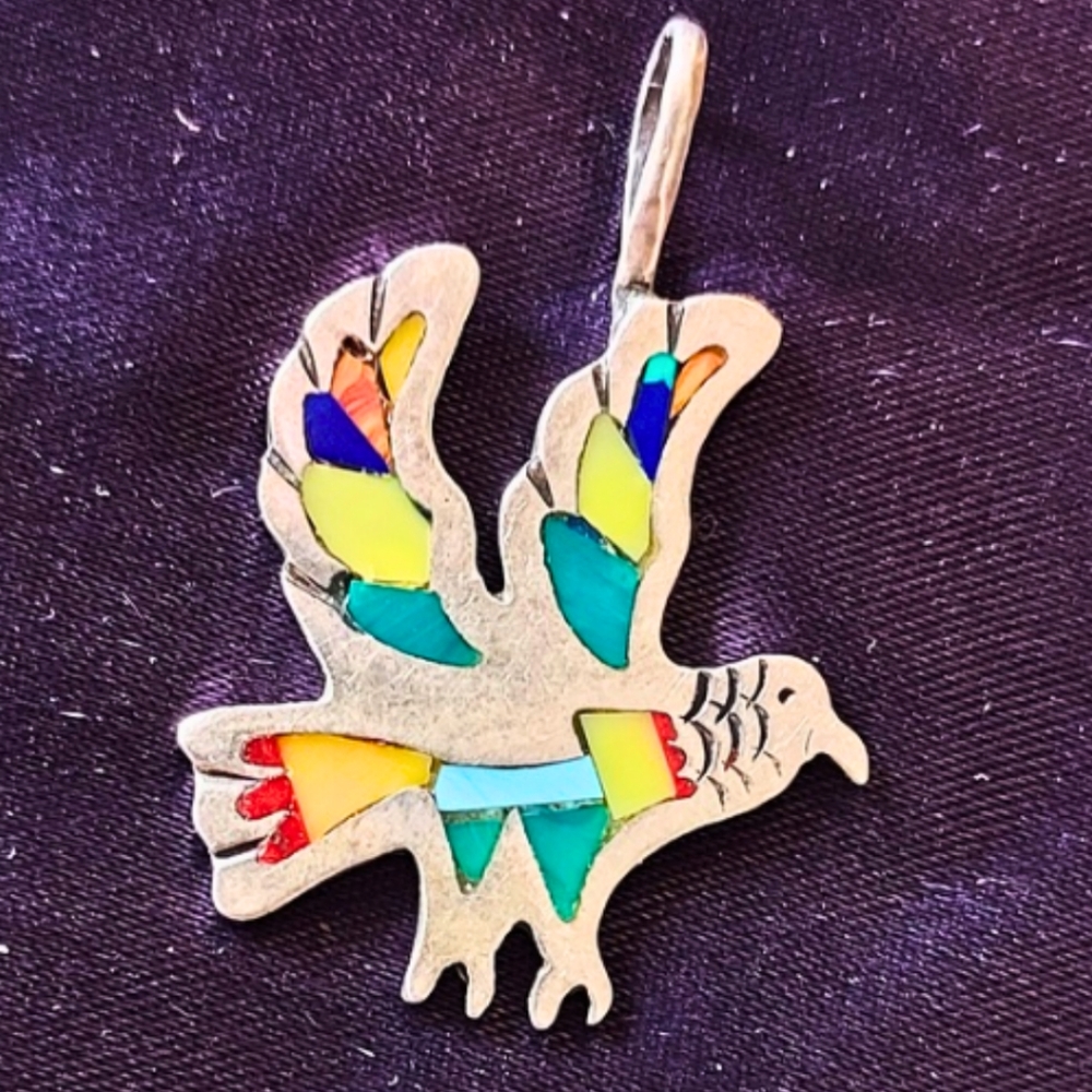 Stunning sterling silver and multi-colored collaged carved bird pendant
